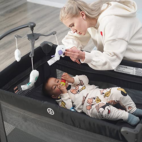 4 In 1 Portable Baby Crib And Nursery Center With Removable Canopy, Changing Table, Lockable Wheels And Storage Bag