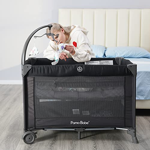 4 In 1 Portable Baby Crib And Nursery Center With Removable Canopy, Changing Table, Lockable Wheels And Storage Bag